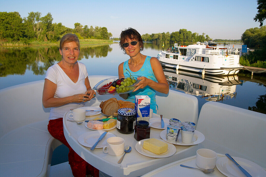 breakfast on the houseboot on the river Havel at Ketzin, Havel, Brandenburg, Germany, Europe
