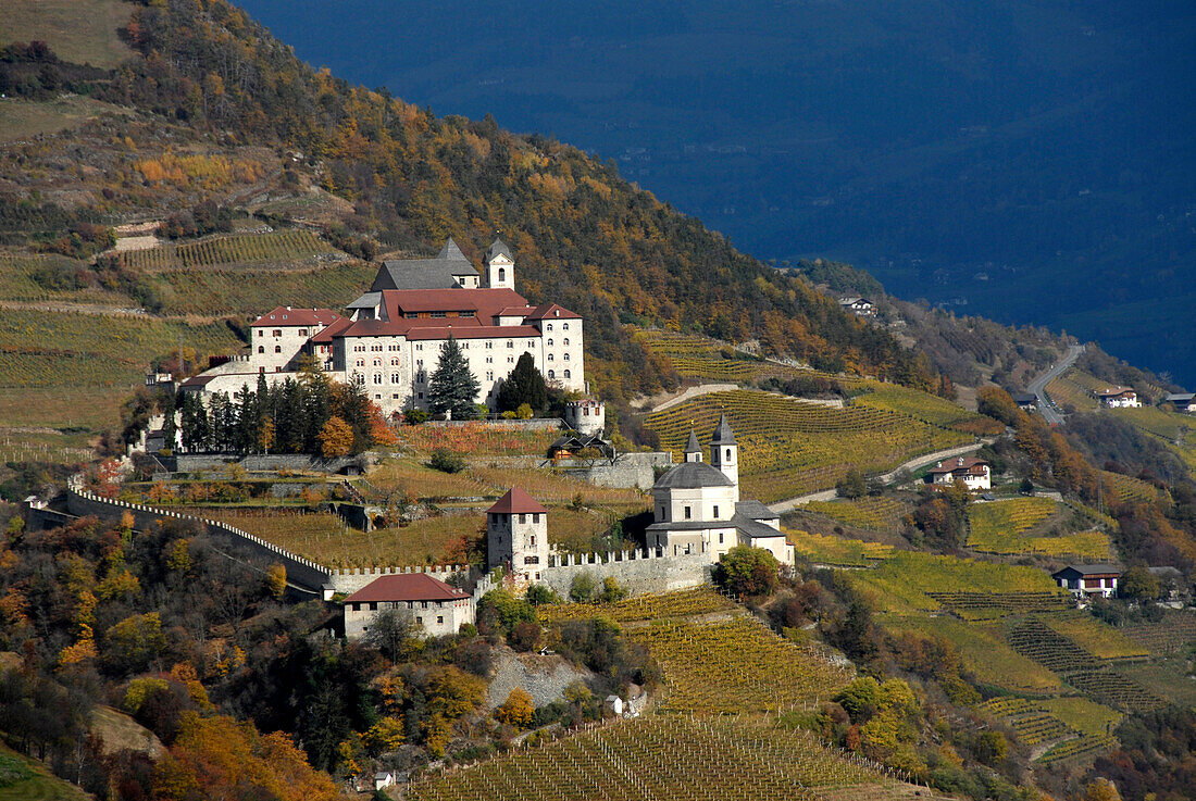 Säben abbey at a mountainside in autumn, Klausen, Valle Isarco, South Tyrol, Italy, Europe