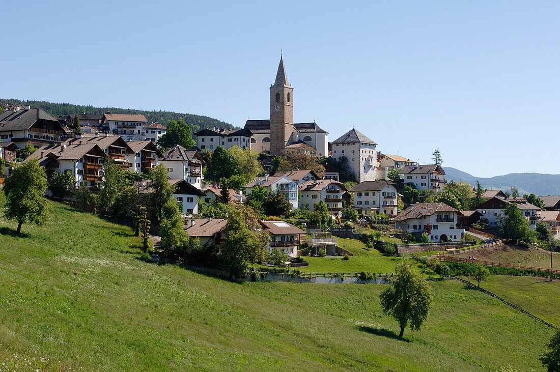 Mountain village with houses and church, Jenesien, South Tyrol, Italy