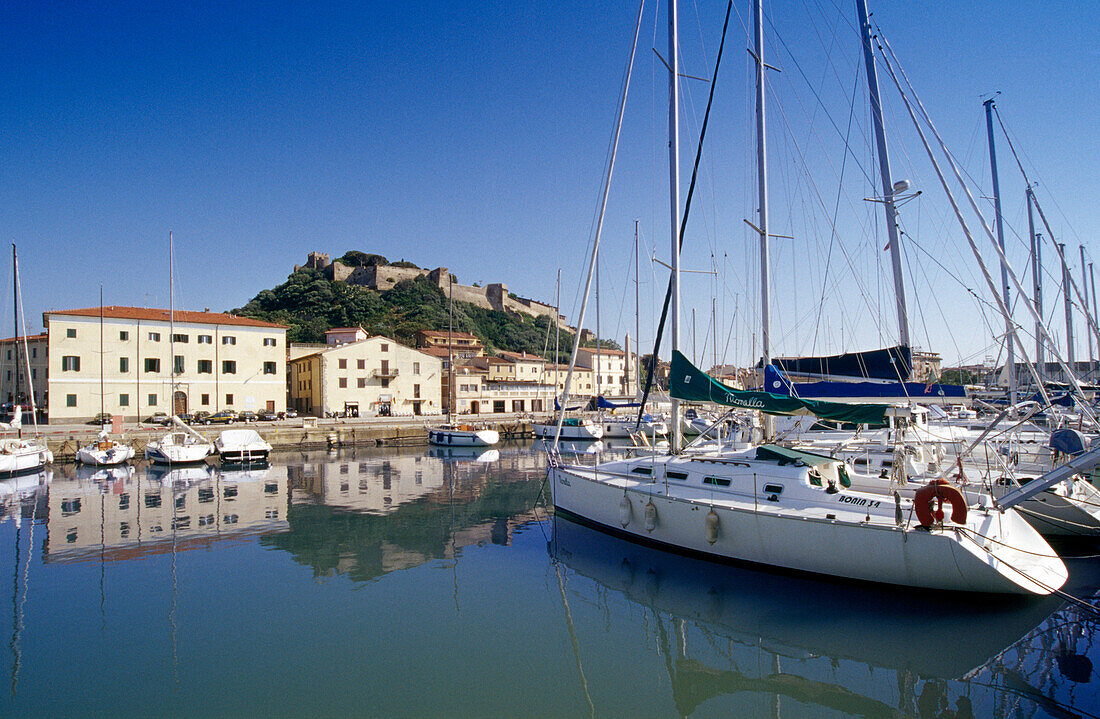 The marina of Castiglione della Pescaia under blue sky, Maremma, Tuscany, Italy, Europe