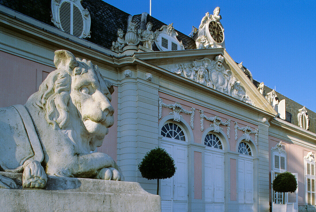 Lion sculpture at the main portal of Benrath castle, Dusseldorf, Lower Rhine Region, North Rhine-Westphalia, Germany