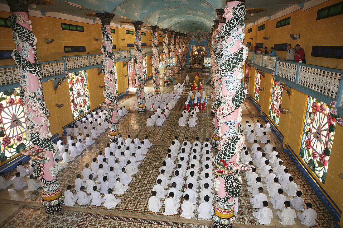 Caodai Great Temple, prayers. Tay Ninh. Vietnam.