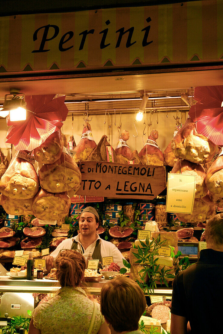 Vendor and customers at market stall Perini at Mercato Centrale, Florence, Tuscany, Italy, Europe