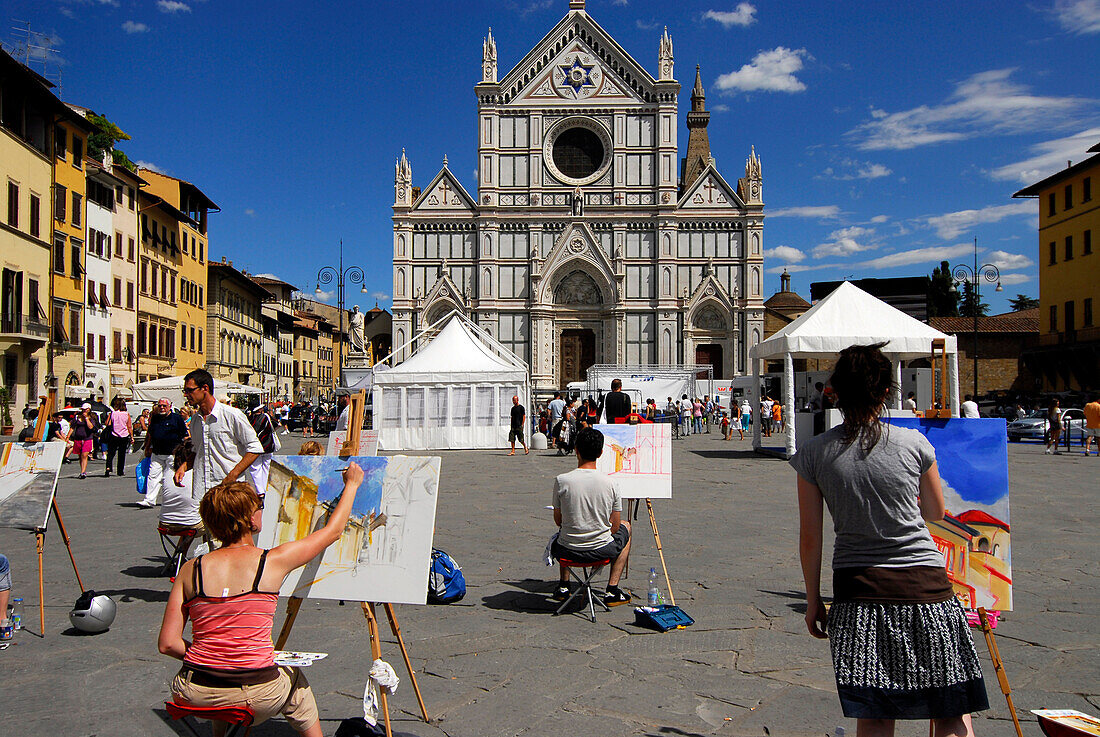 Painting class in front of Santa Croce church under blue sky, Florence, Tuscany, Italy, Europe