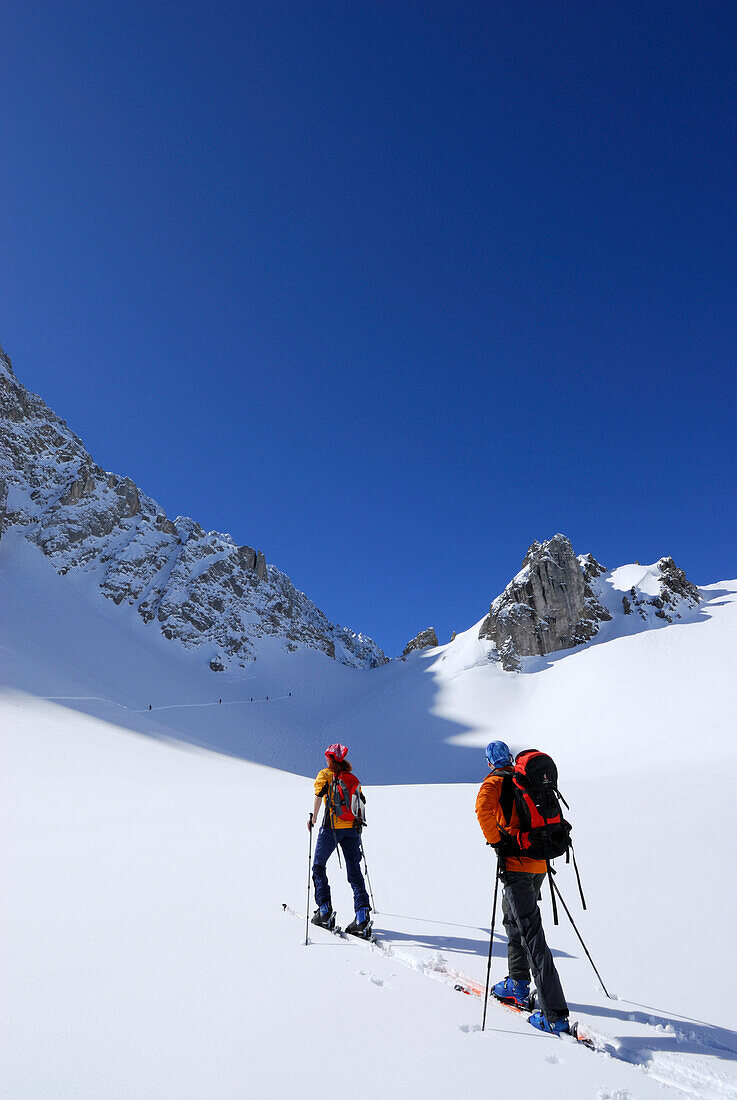 Two backcountry skiers ascending, Tajatoerl, Mieminger range, Tyrol, Austria