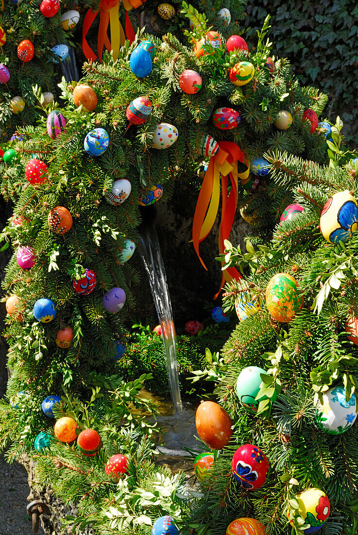 Easter decorated fountain, Goessweinstein, Upper Franconia, Bavaria, Germany