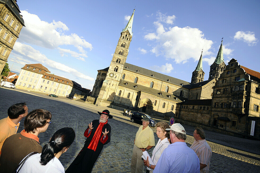 Guided city tour in cathedral square, Bamberg, Upper Franconia, Bavaria, Germany