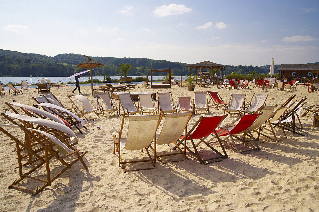 Beach chairs at lakeside, lake Baldeneysee, Essen, Ruhr area, North Rhine-Westphalia, Germany