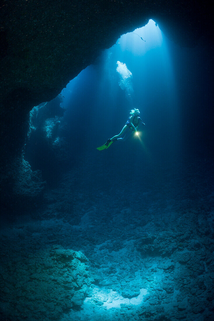 Diver in Blue Hole Cave, Micronesia, Palau