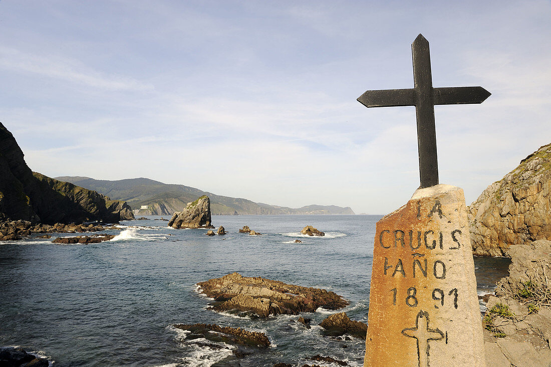 Iron cross in Gaztelugatxe. Biscay, Basque Country, Spain