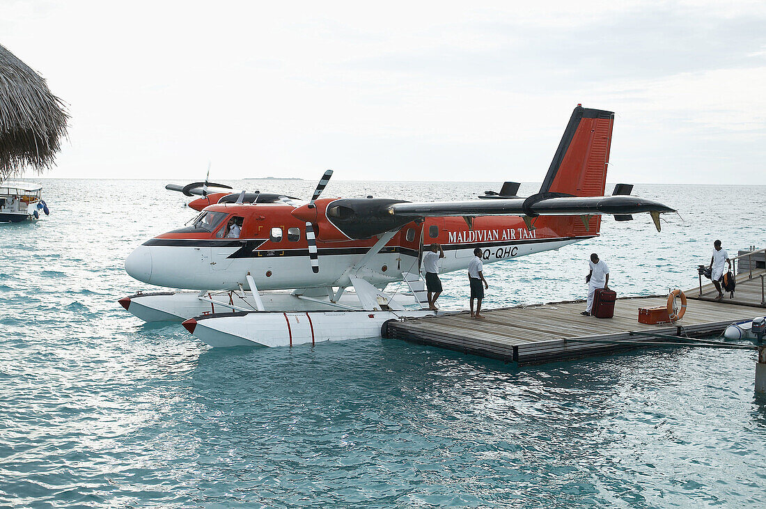 Air taxi at a pier. Maldives Island, Indian Ocean.