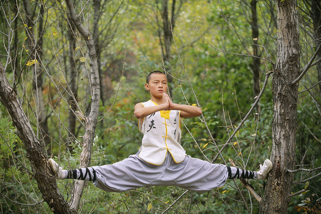 Wushu student practising kung fu, shaolin, China