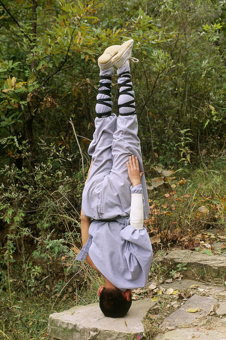 Wushu student practising kung fu, shaolin, China