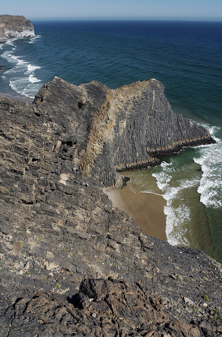 Volcanic cliffs, El Barronal beaches. Cabo de Gata-Nijar Biosphere Reserve, Almeria province, Andalucia, Spain