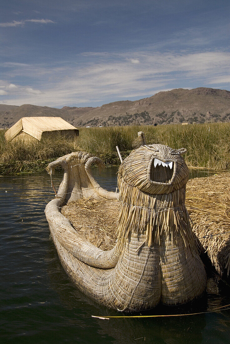 Peru, Lake Titicaca, floating islands of the Uros people, traditional reed boat