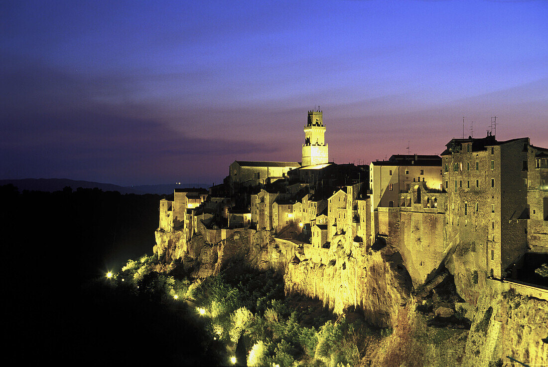 Italy, Tuscany, Pitigliano at dusk