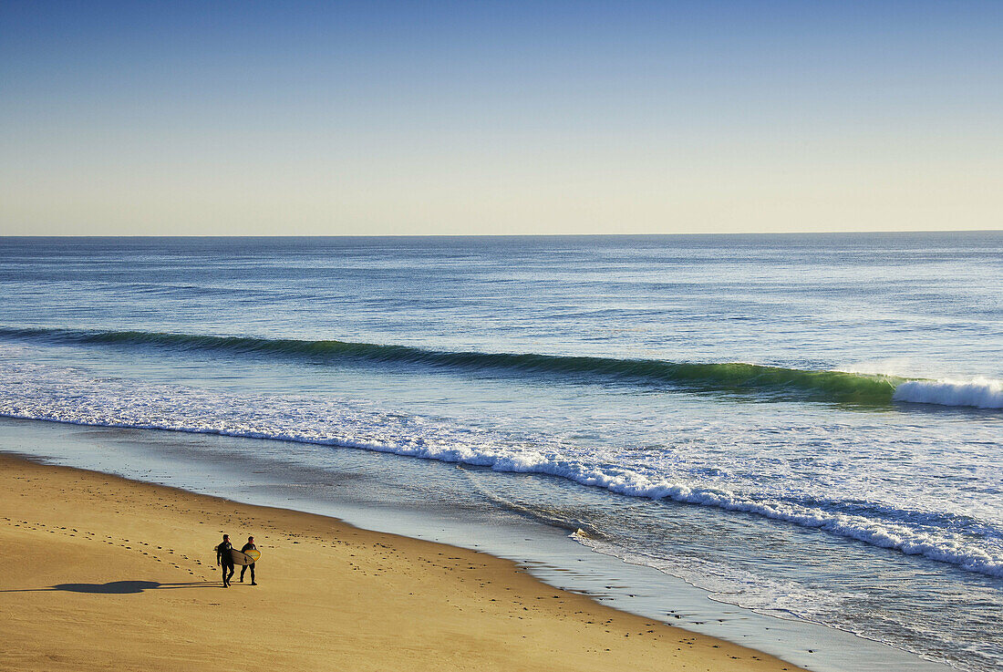 Surfers Walking on Beach, Nauset Light Beach, Cape Cod National Seashore, Eastham, Cape Cod, Massachusetts, USA