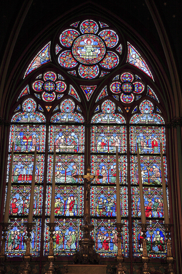 France, Paris, Notre Dame Cathedral interior, stained glass window