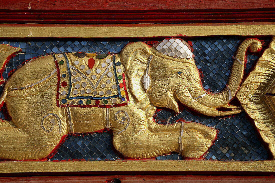 Thailand, Chiang Rai, Wat Ming Meuang buddhist temple, elephant relief