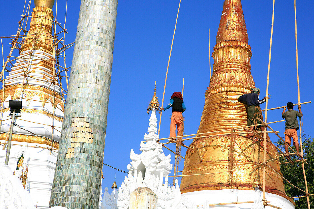 Workers on bamboo scaffold at the Shwedagon Pagoda, Rangoon, Myanmar, Burma, Asia