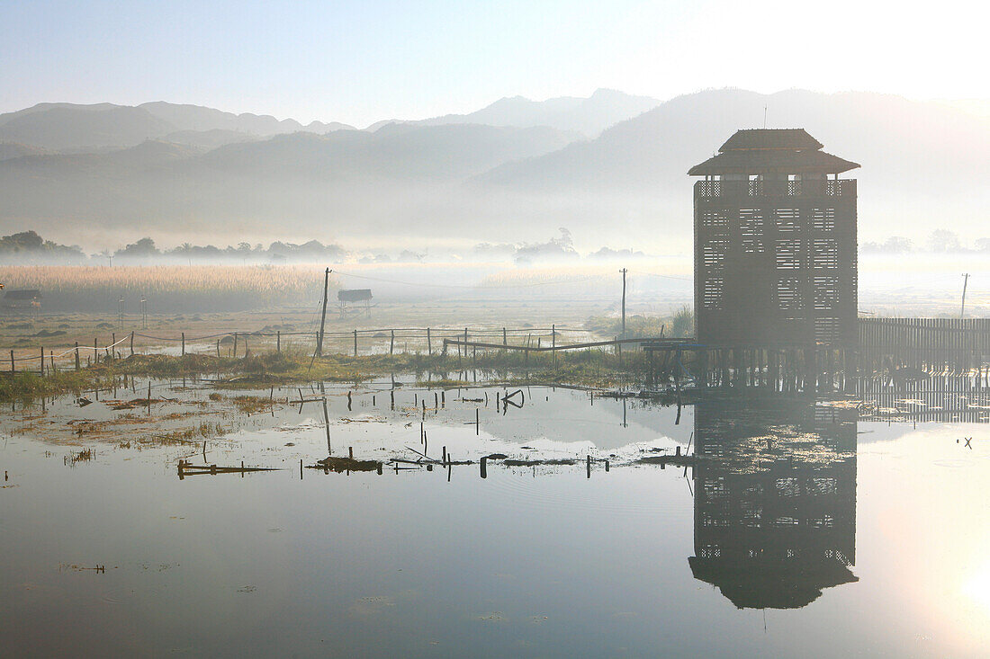 Inle Lake and mountain range in the morning mist, Inle Lake, Shan State, Myanmar, Burma, Asia