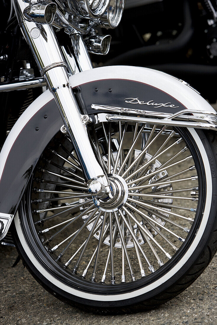 Close_up shot of Harley Davidson motorcycle spoked wheel
