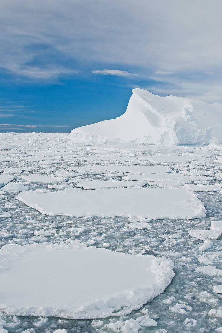 Broken first year floe ice mixed with brash ice below the Antarctic Circle around the Antarctic Peninsula during the summer months  More icebergs are being created as global warming is causing the breakup of major ice shelves and glaciers