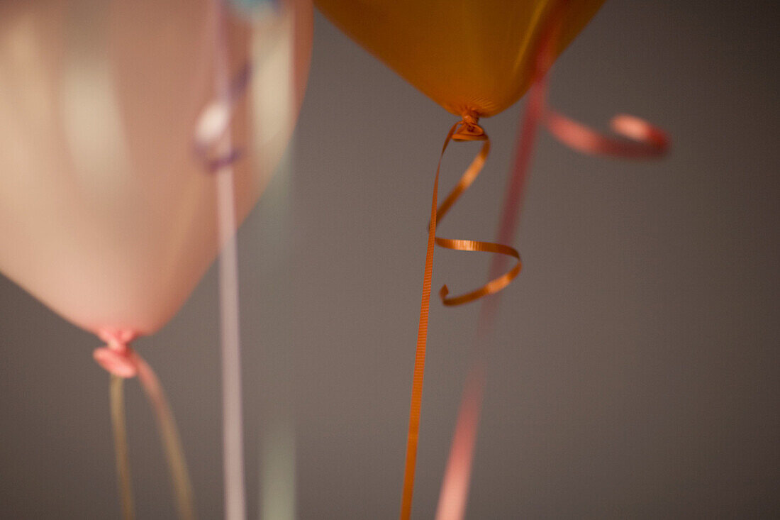 Pink and orange balloons.