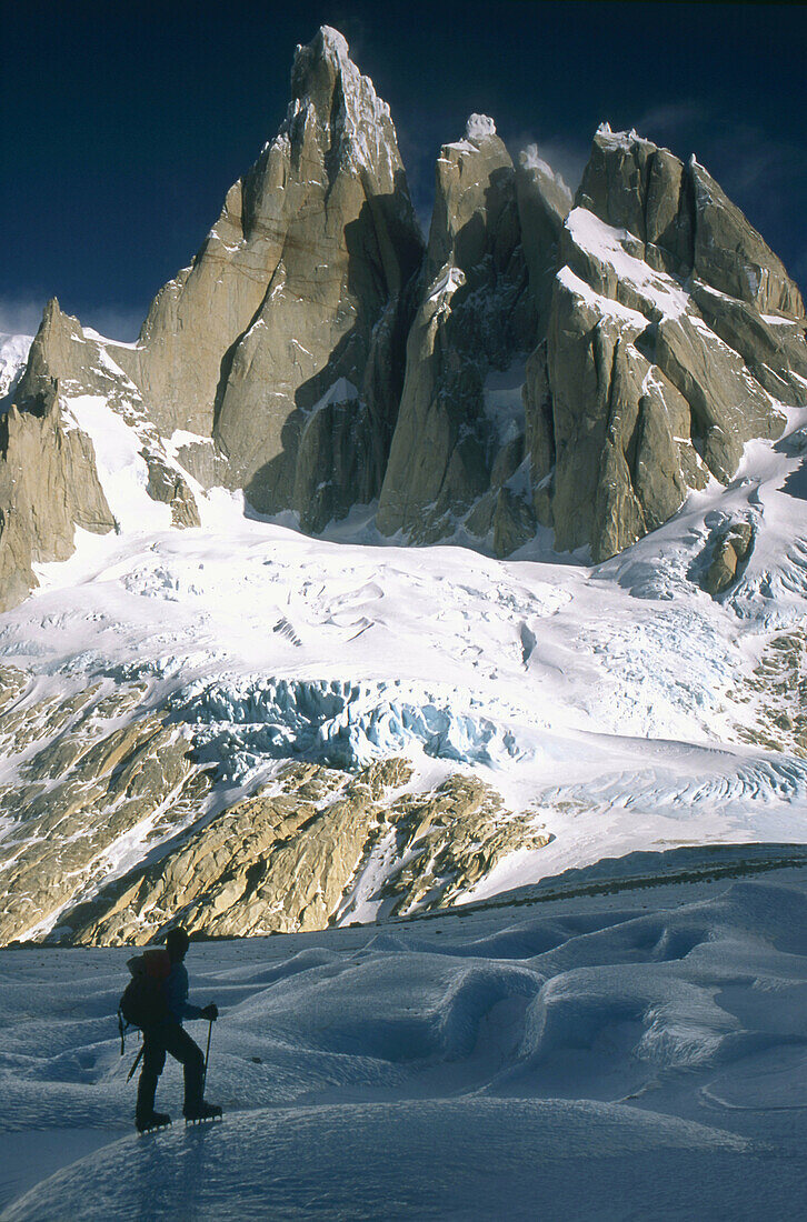 Climber on Torre Glacier under east face of Cerro Torre Los Glaciares National Park Patagonia