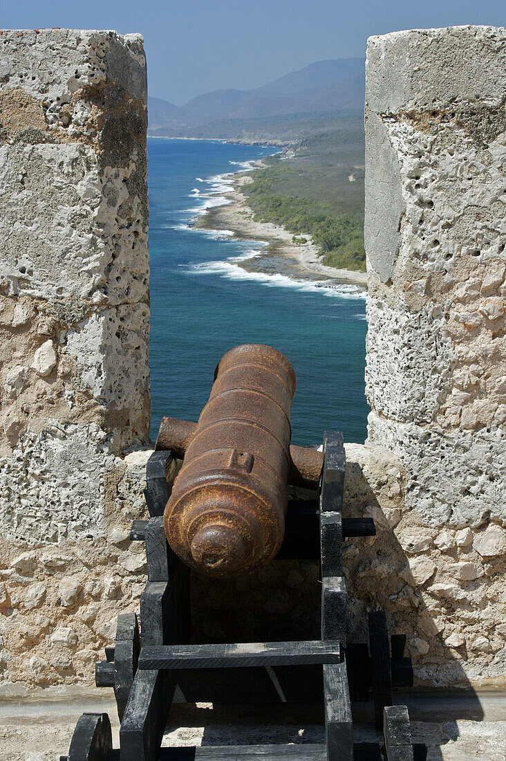 A view of the Castillo de San Pedro del Morro, showing a canon aimed over the harbor enterance.
