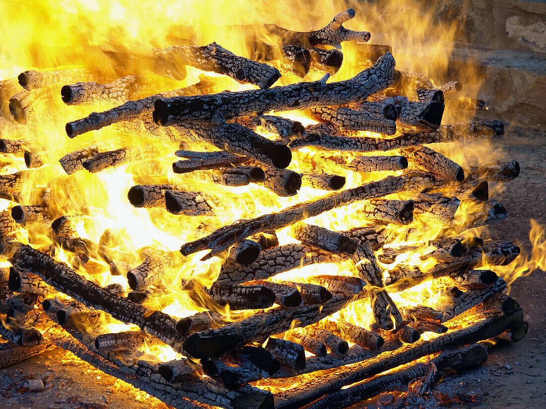 fire preparation for the ancient tradition of step-fire in San Pedro Manrique (Soria). Spain