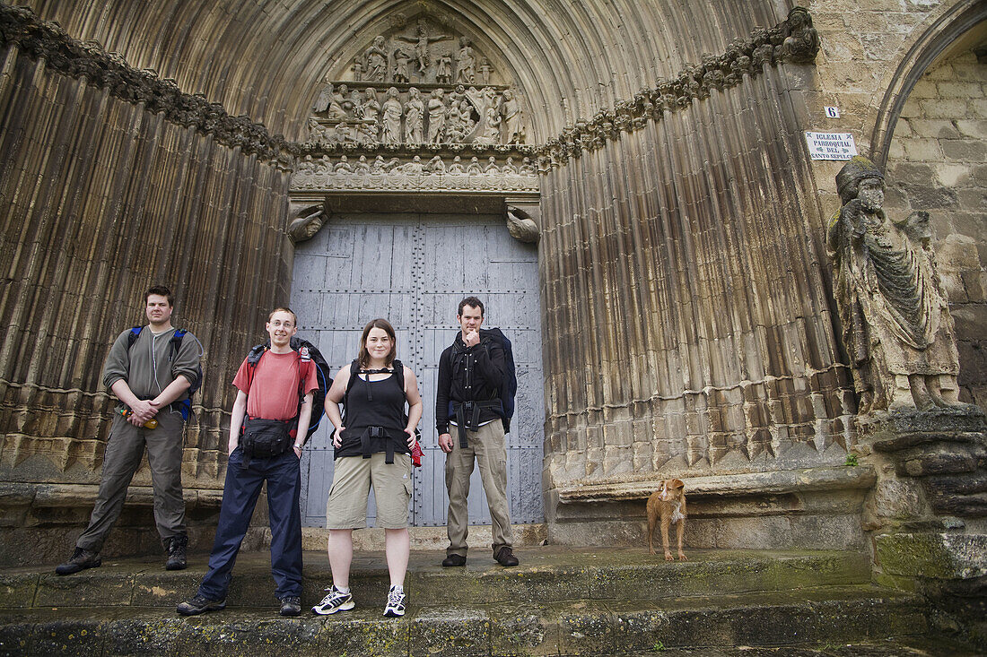 Pilgrims in front of the church of Holy Sepulchre, Estella. Navarra, Spain