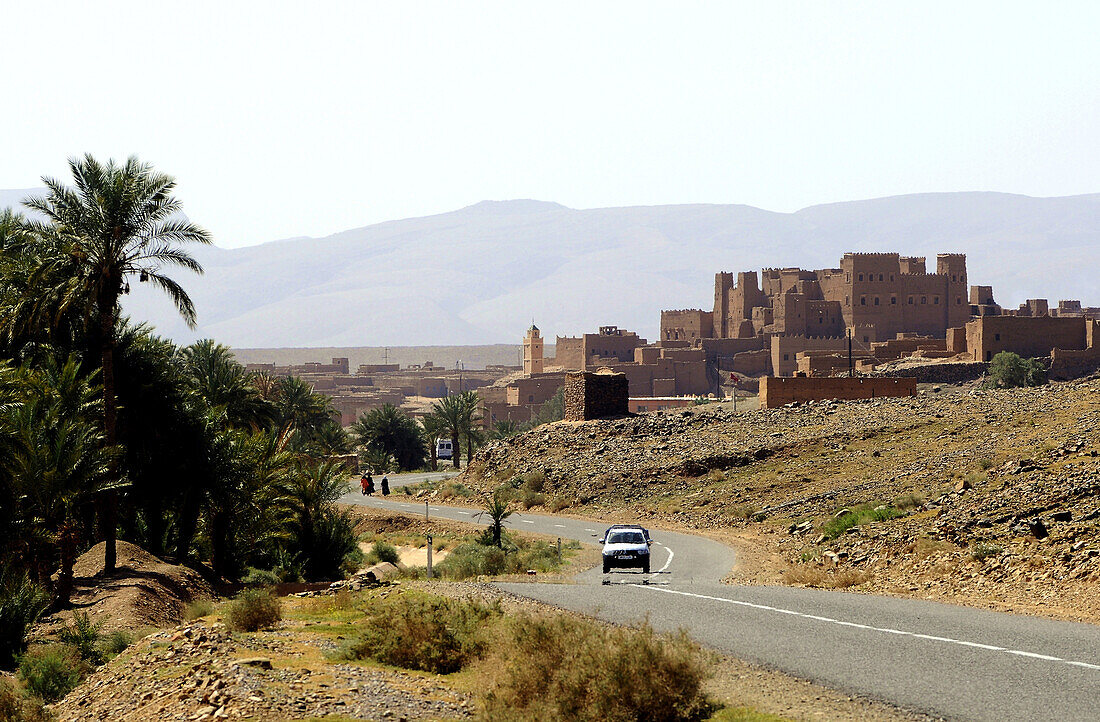 Kasbah Igdaoun at a country road, Draa valley, South Morocco, Morocco, Africa