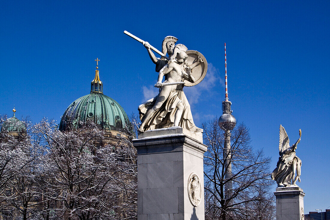 Sculptures by Schinkel at castle bridge under the lime trees ,background dome,  Berlin