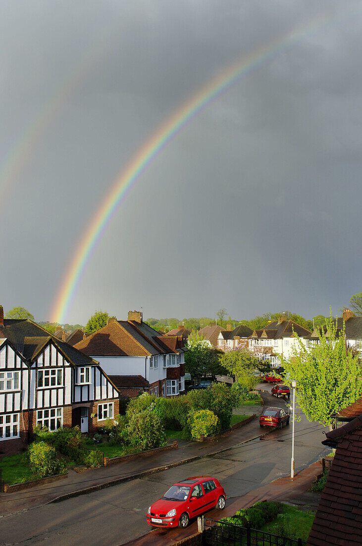 uk, england, surrey, rainbow over suburbs 2008