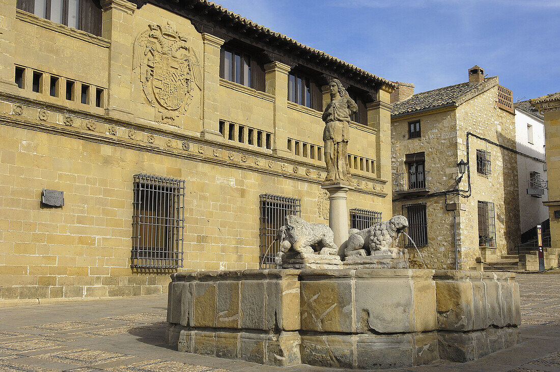 Fountain of the lions and Antigua Carniceria (old butchers shop) in Populo square, Baeza. Jaen province, Andalucia, Spain