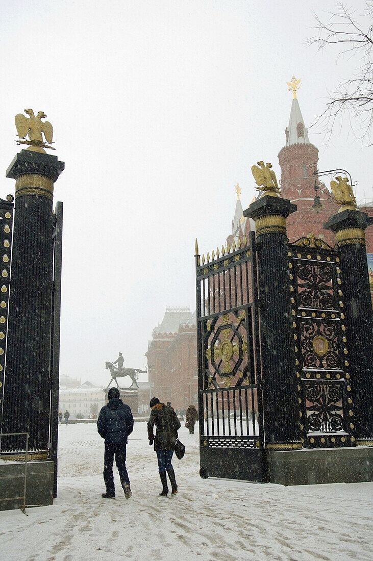 A blizzard blows around the gate between Alexandrovsky Park and Manezhnaya Square, Moscow, Russia
