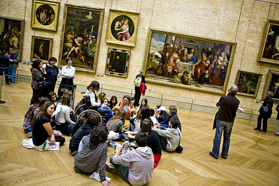 Visitors in the Louvre Museum, Paris. France