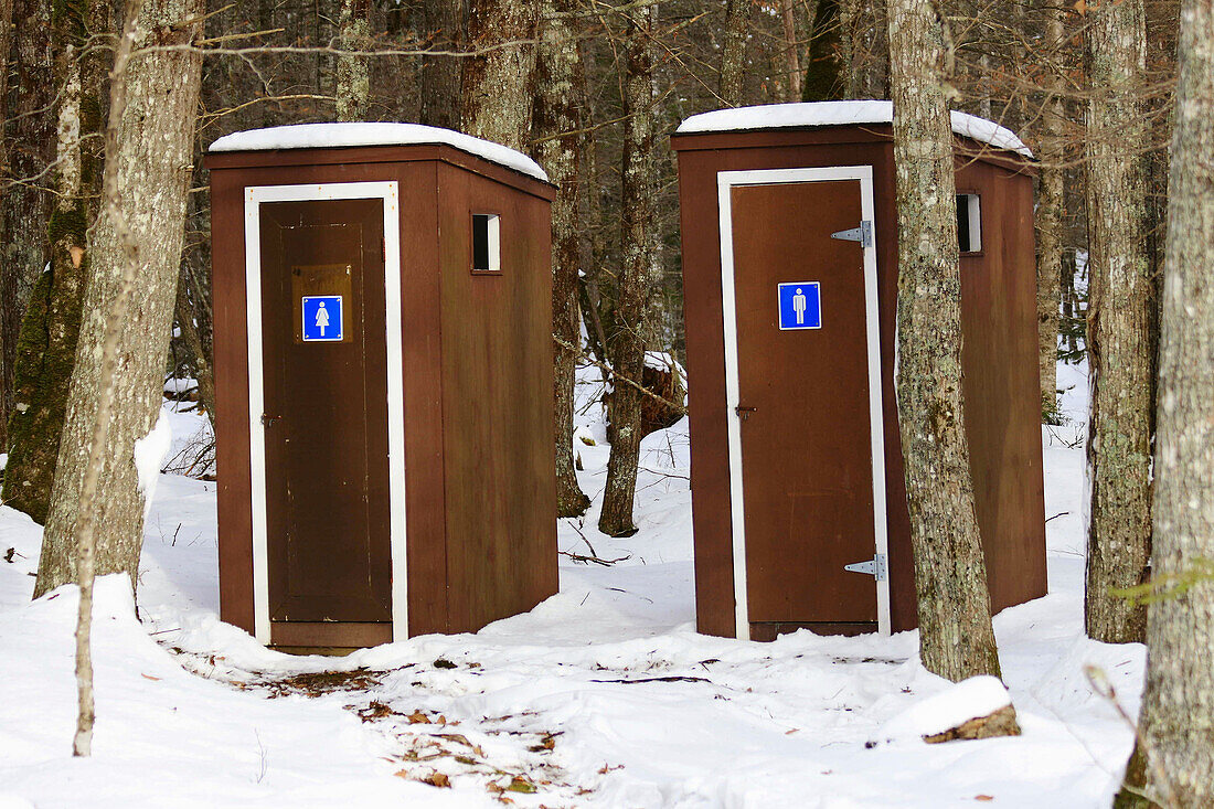 His and hers outhouses in Canada