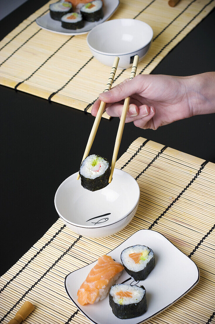Adult, Adults, Bowl, Bowls, Chopstick, Chopsticks, Color, Colour, Cuisine, detail, details, Dish, Dishes, Food, Foodstuff, Gastronomy, hand, hands, Hold, Holding, human, indoor, indoors, interior, Japanese food, Lunch, Lunches, Meal, Meals, Nourishment, O