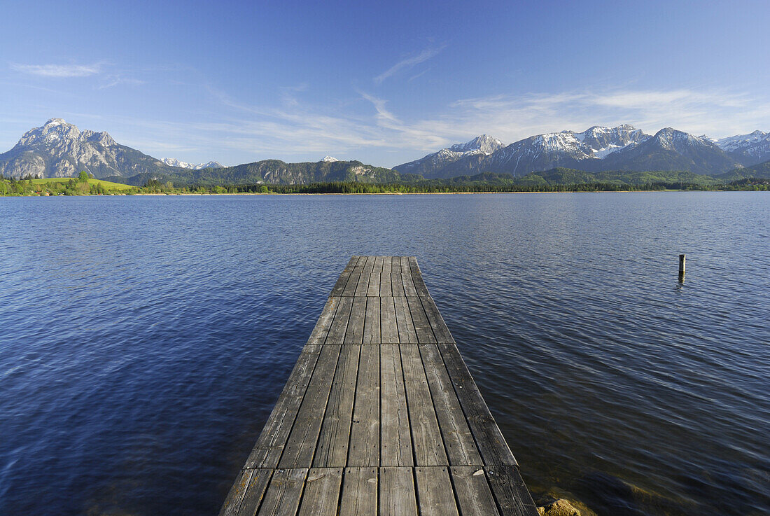 Jetty at lake Hopfensee with Tannheim range in background, Allgaeu, Swabia, Bavaria, Germany