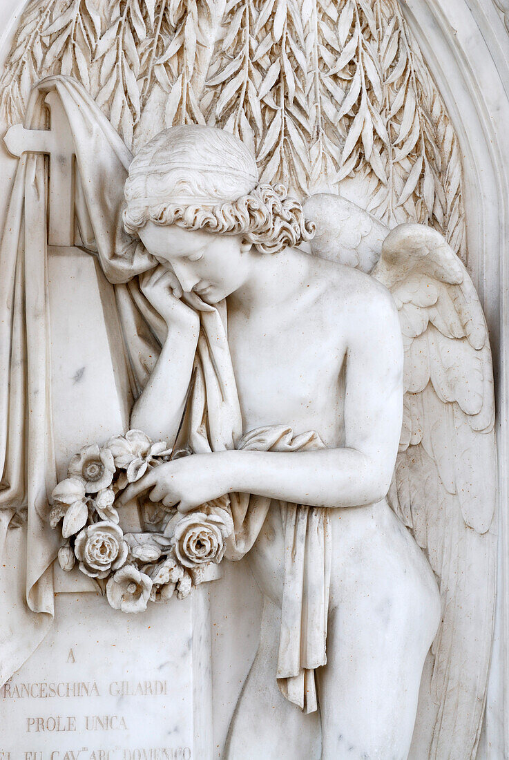 Angel of marble holding wreath of flowers in hands, San Abbondino graveyard, Gentilino, Lugano, Ticino, Switzerland