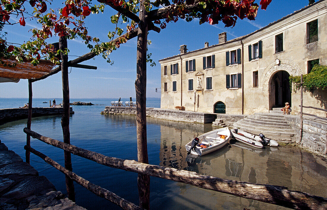 View from the terrace of the restaurant Locando San Vigilio to the lake, Punta San Vigilio, Lake Garda, Veneto, Italy, Europe