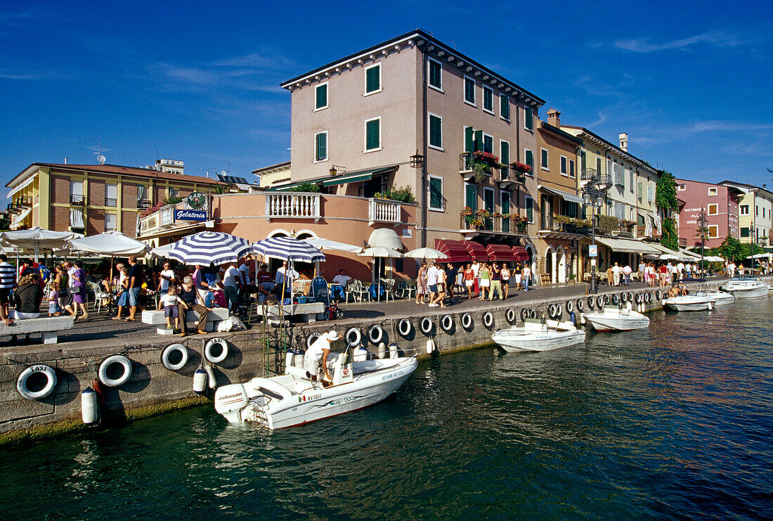 Motor boats at harbour under blue sky, Lazise, Lake Garda, Veneto, Italy, Europe