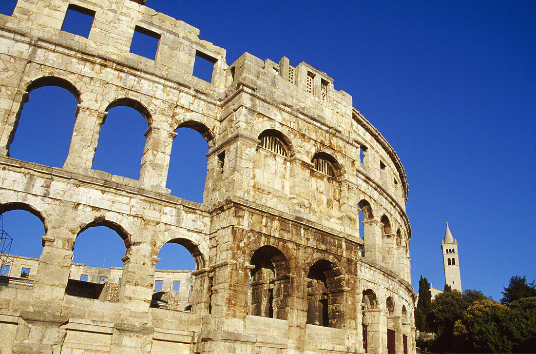 Roman amphitheater under blue sky, Pula, Croatian Adriatic Sea, Istria, Croatia, Europe