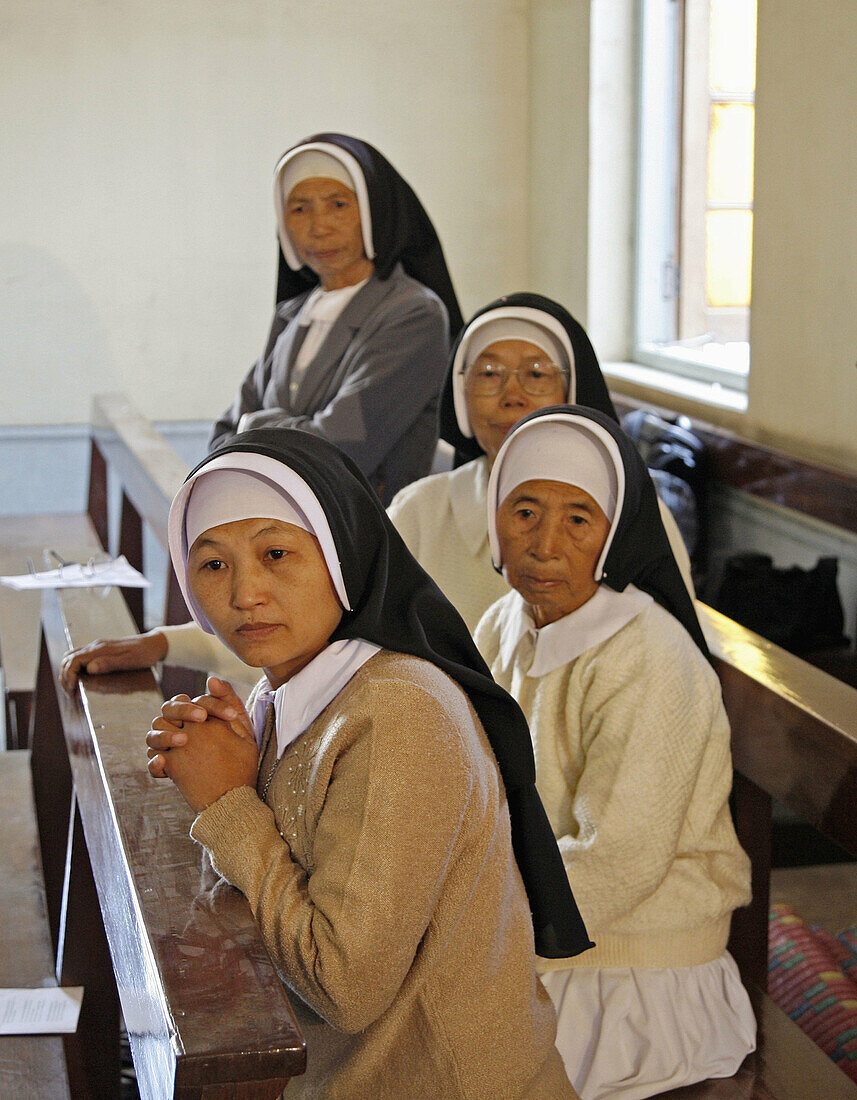 Myanmar  Nuns attending  Catholic wedding of tribal Kachins at  Myitkyina, a largely Kachin community in north Burma near the Chinese border