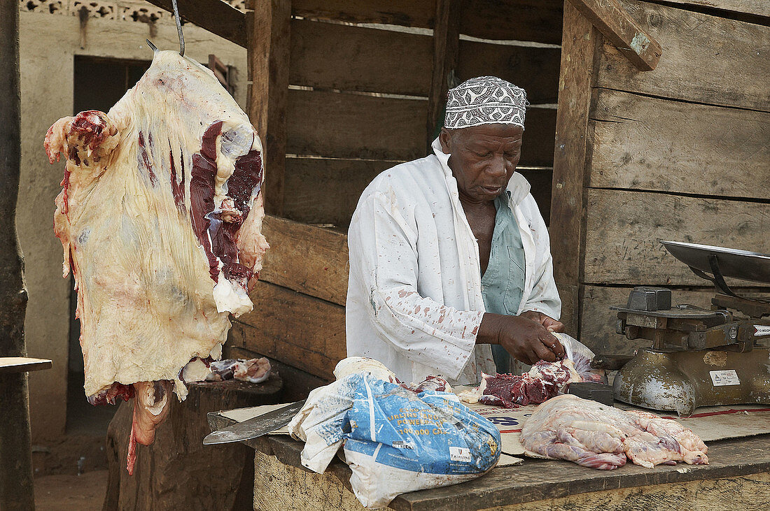 UGANDA  Butchers stall at the street market in  Karagi village, Mukono District