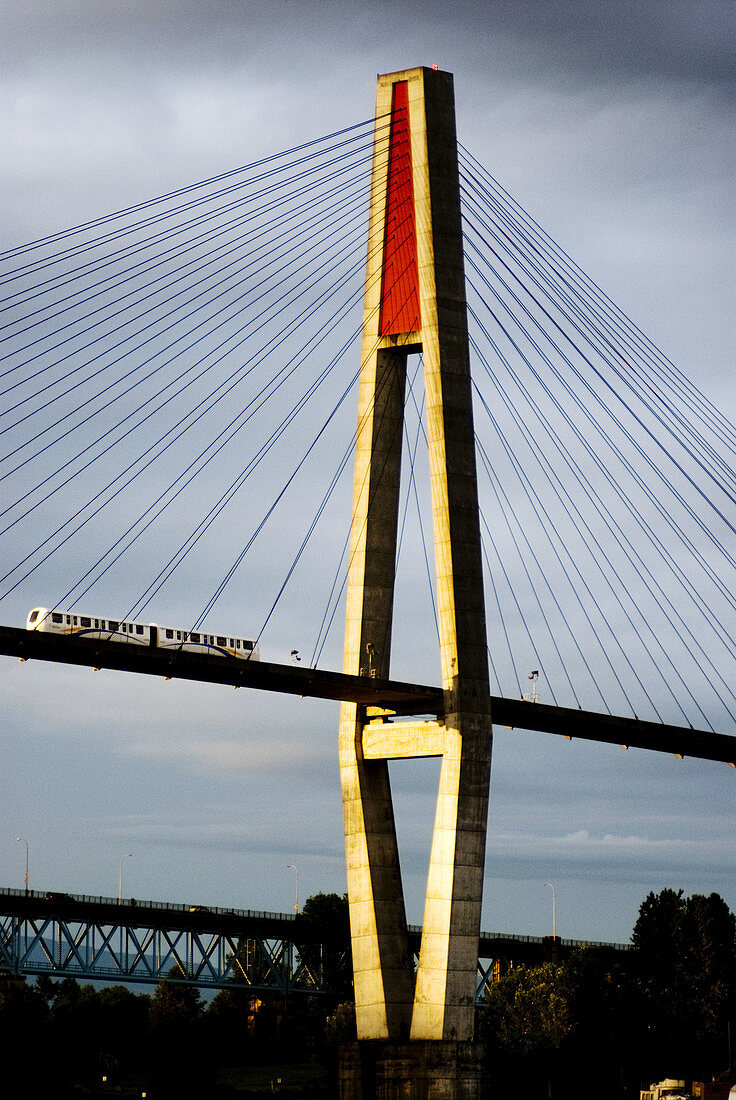 Skytrain Bridge over the Fraser River linking Vancouver and New westminster with Surrey, BC, Canada