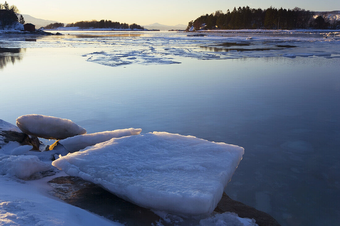 Snow covered landscape & fijord, Ofotfjorden near Bogen, near Narvik, Norway