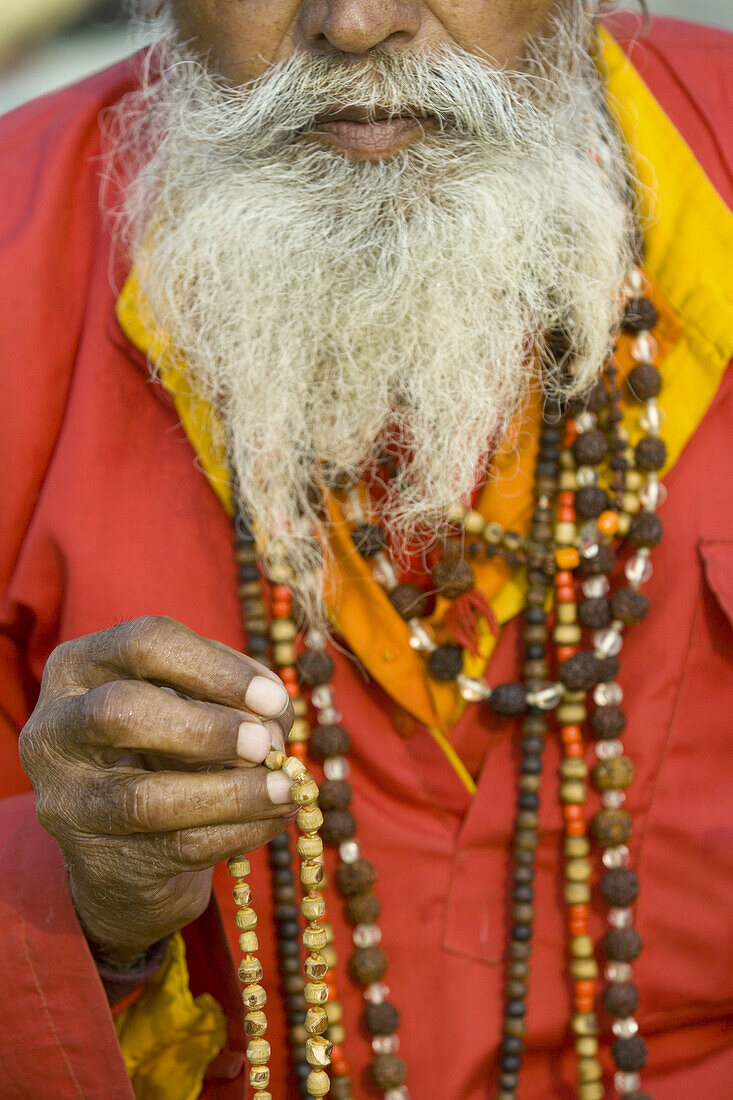 Sadhu with beads at Kumbh Mela festival. Allahabad, Uttar Pradesh, India
